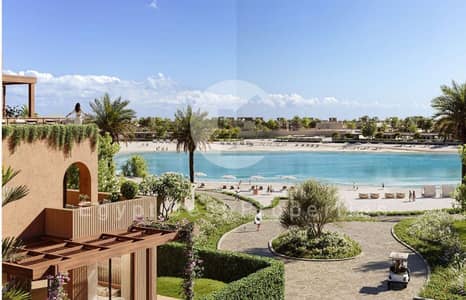 شاليه كبير يطل مباشرة على اللاجون بحري على 8 سنوات 3 غرف  نوم  في  رمله  الساحل الشمالي  راس الحكمه