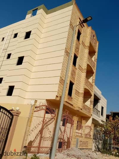 A building for sale in Badr City.