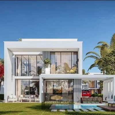 Receive immediately a townhouse Middle with a lagoon view inside the compound Lake West next to La Vista and in front of Beverly Hills