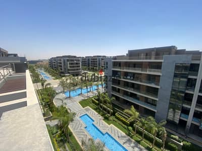 Penthouse for sale in Al Patio Oro Compound, Fifth Settlement  Area: 128 sq m + 30 sq m penthouse (total built-up area 158 sq m) + 70 sq m open roof t