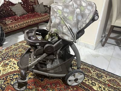 عربية أطفال جراكو (Graco) أصلية مستعملة بحالة ممتازة للبيع