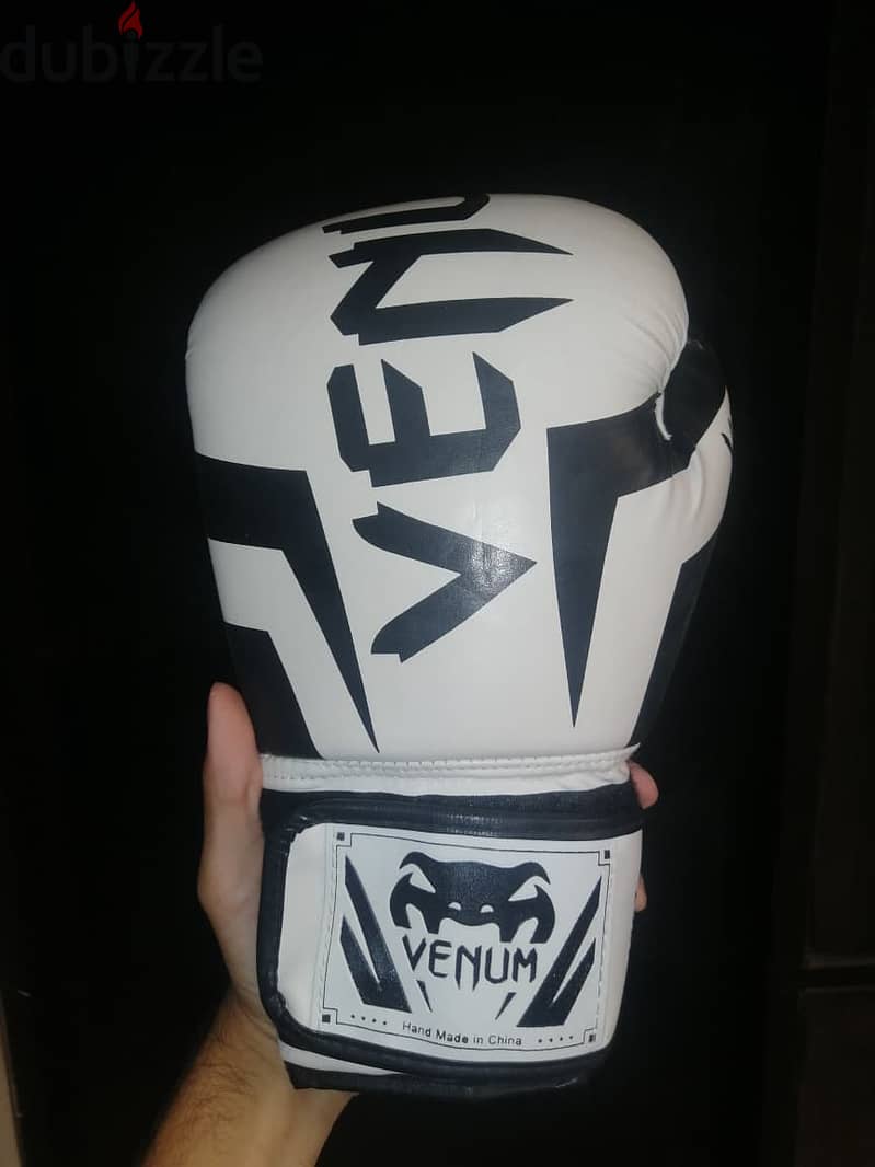 Venum boxing gloves with hand wraps 1