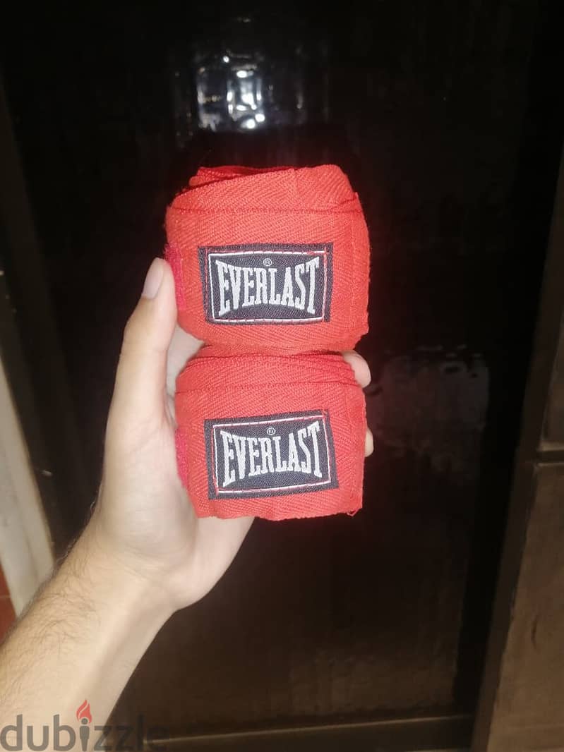 Venum boxing gloves with hand wraps 4