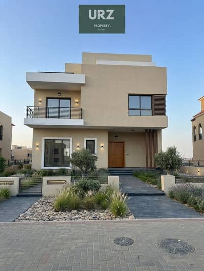 Best-priced 5-bedroom villa on the lake with a huge discount on Suez Road, near Rehab, Saada, Mivida, New Cairo & the Middle Ring Road.