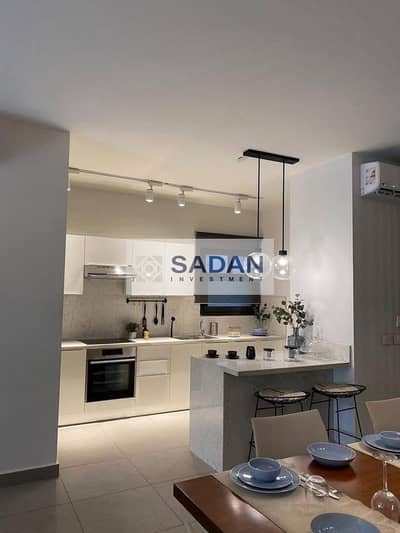 Apartment for sale with a 50% discount in Taj City Compound on the Suez Direct Road in the most prestigious phase, Origami      - Taj City.          .