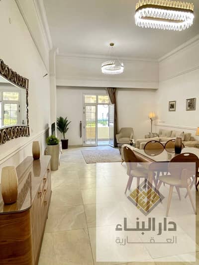 20 % own  ready to move fully finished  apartment for sale in new garden city new capital new cairo , next to al maqsed and sarai
