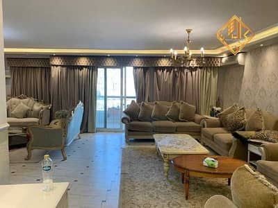 Super deluxe furnished apartment for sale in Dokki, off Tahrir Street