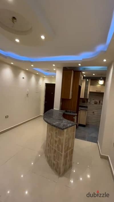 90 sq m apartment for rent in Al Rehab, prime location near services. Rent includes kitchen, high-end finishing