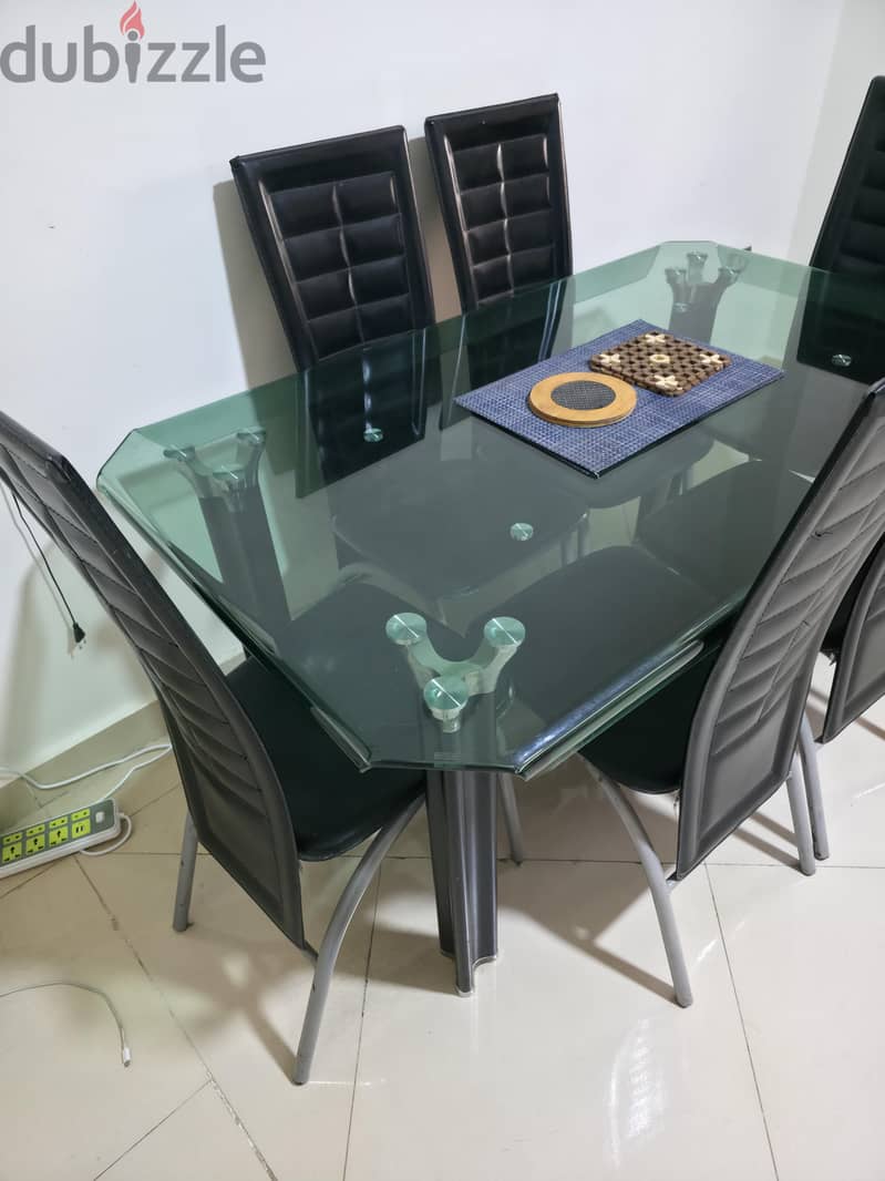 Dinning table  used with  6 chairs 4