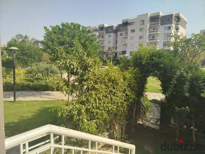 For sale in Madani, a ground floor apartment with a garden of 112 meters and a garden of 60 at b10, wide view garden, largest model with room