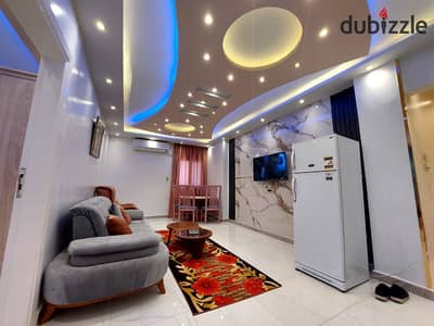 Furnished, air-conditioned hotel-style apartment next to City Stars, available for daily and monthly rent for families. Excellent location in Nasr Cit