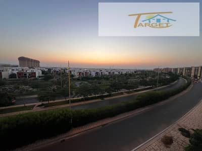 Apartment for sale in Madinaty (B6): 103 sqm, featuring luxury hotel-style finishing, 3 bedrooms (including a master suite), and 2 bathrooms, with a p