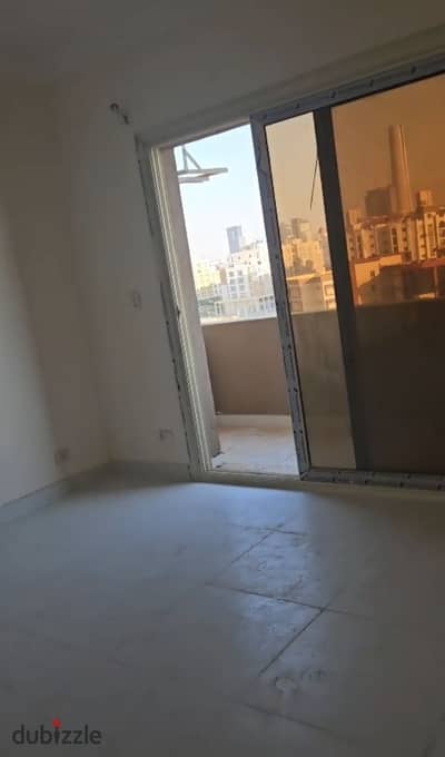 Apartment 120 m 3 bedrooms fully finished with prime location overlooking a view of the Iconic Tower installments for sale in El Maqsad, R3