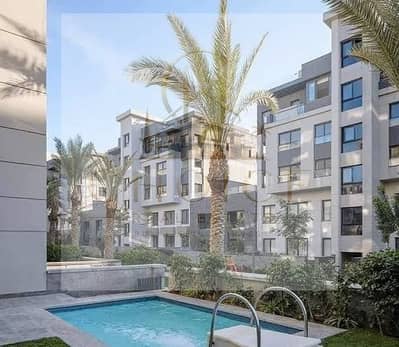 Apartment with garden, 3 bedrooms, smart home finishing, landscape view, for sale at a bargain price in Trio Gardens Compound, Fifth Settlement, Palm
