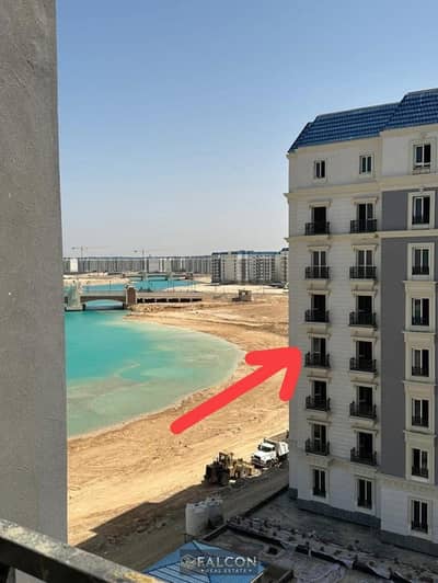 شقه بحري الطريق ( lagoon view - Fully Finihed )129مـتر بـ اقل سعر داخل الحي اللاتيني - امام ابراج city edge بجوار مارينا 5