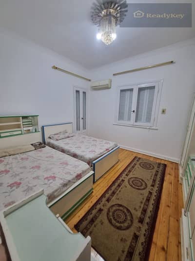 Apartment for rent in Heliopolis directly overlooking Al-Hijaz Street fully air-conditioned first floor fully furnished fully complete with electric appliances three bedrooms including one