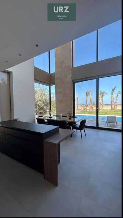 بسعر وفرصة مميزة فيلا Frist row تشطيب كامل مع التكيفات فيو بانورامي خيالي في الساحل الشمالي بالقرب من مرسي بغوش و modon وهاسيندا والماظة باي  للبيع