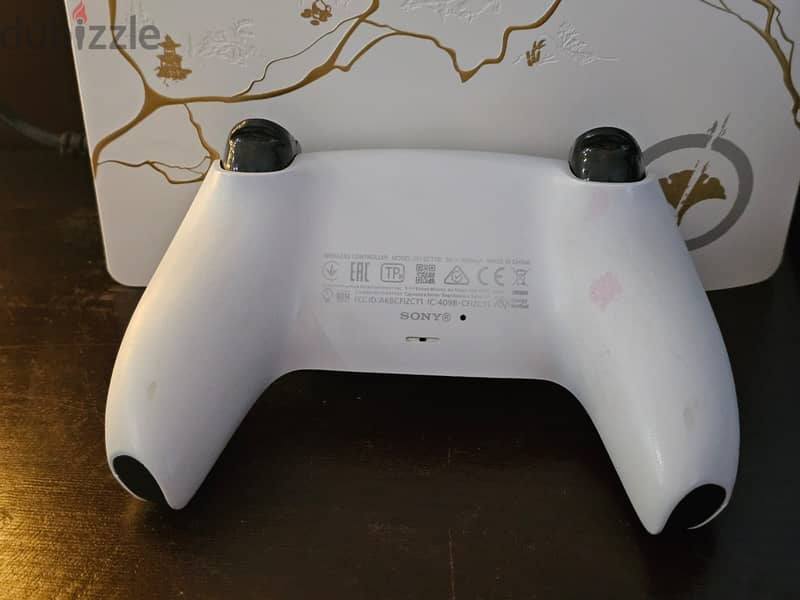 Dualsense Chroma Indigo (New) + Dualsense White 1