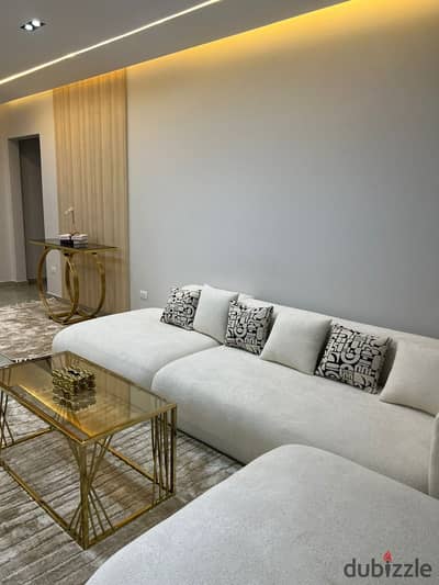 Luxury Apartment for Rent in Hyde Park New Cairo, featuring an elegant design and luxurious modern furniture, with a Large Terrace, Outdoor Furniture,