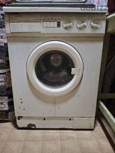 غسالة frigdaire خردة وزنها 70 كيلو