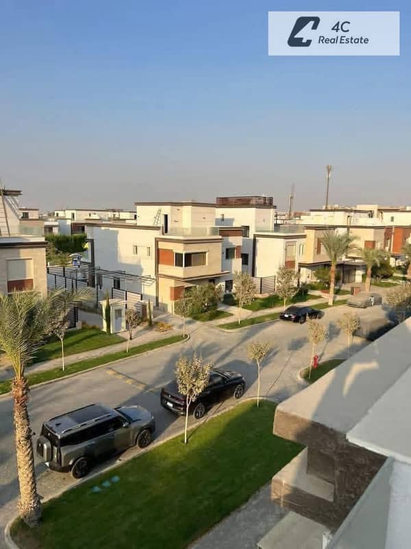 Twin house villa for sale 300m + a special roof prime location 4 bedrooms in Azzar 2 Compound Fifth Settlement New Cairo