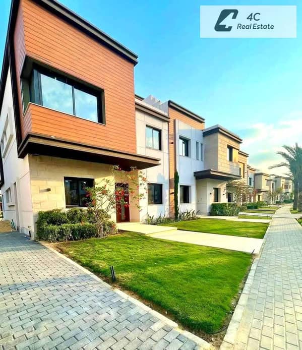 Twin house villa for sale 300m + a special roof prime location 4 bedrooms in Azzar 2 Compound Fifth Settlement New Cairo