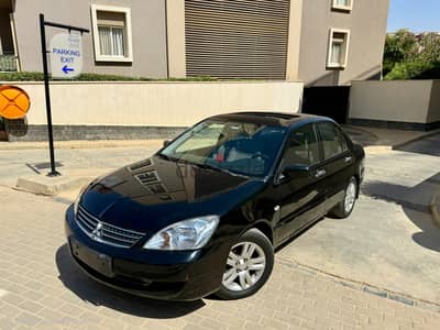 Mitsubishi Lancer puma 2013 - ٥٤ الف كيلو فقط - فتحه سقف