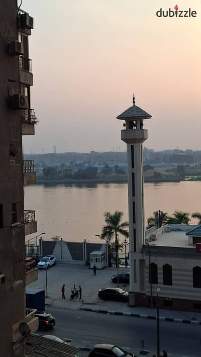 Furnished apartment for rent – Corniche Maadi – Al-Ekhwa Towers (Police Housing Compound)  Very prime location directly across from Al-Shorouk Club  Panoramic view directly on the Nile River  Waterfront – Secure compound with 24-hour security  Apartment specifications:  Spacious reception  Two bedrooms  New bathroom  Kitchen