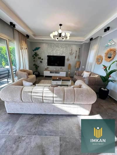 180m² finished apartment + 73m² garden (immediate delivery) for sale with a 10-year installment plan in Mayan Compound, Fifth Settlement.
