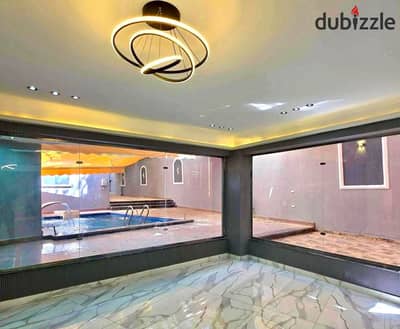 For sale, a duplex villa of 500 meters with a large swimming pool, 5 rooms, and 5 bathrooms, finished ultra-super lux in a prestigious area at the Pyramids Gardens.