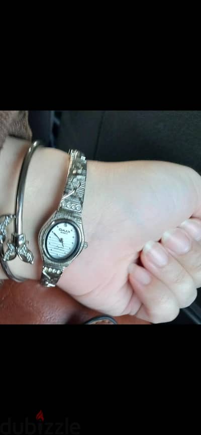 ساعه OMAX ياباني اصليه QUARTZ استعمال مره واحده بس معاها علبتها