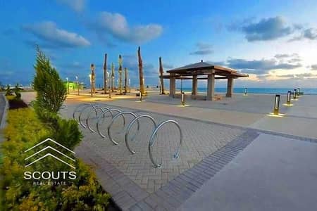 **First-Row Chalet Directly on the Sea – Fully Finished & Equipped**  2-Bedroom Chalet in Ras El Hekma, North Coast, located within El Masyaf.