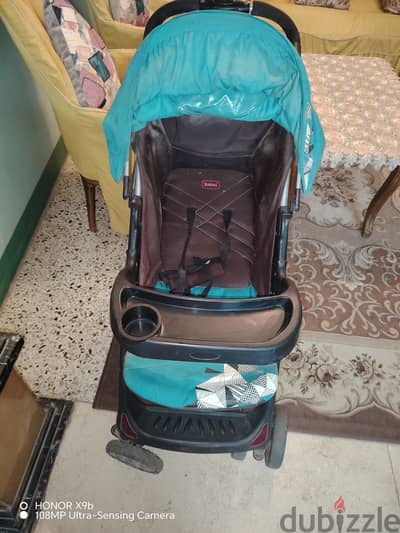 عربة أطفال ماركة junioer