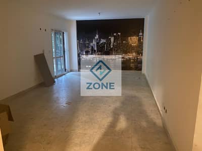 Apartment for sale in Madinaty, ground floor with garden, 128 square meters, garden view, next to Open Air Mall B1