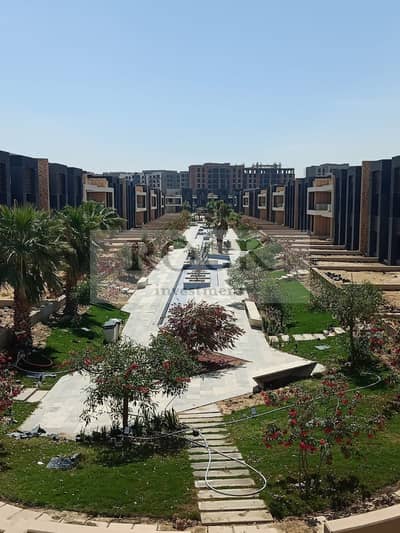For Sale 105 sqm Ground Floor Apartment with Garden in Midtown Compound New Cairo opposite the American University in Cairo (AUC)