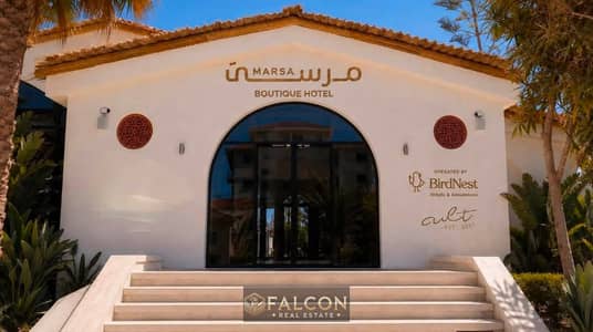 Two-bedroom chalet, fully finished, for sale directly on the sea in Marsa Boutique Marina 5, North Coast