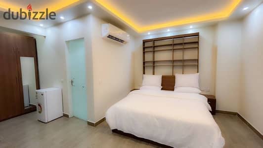 Single Studio for rent in the best location in 6th of October City, Second District, Seventh Neighborhood, in front of MSA University. Includes all services: electricity, water, gas, cleaning, security, elevators, and furniture is changed every week. Cleaning is done every week and laundry is also all on account of the place, and the kitchen is separate.