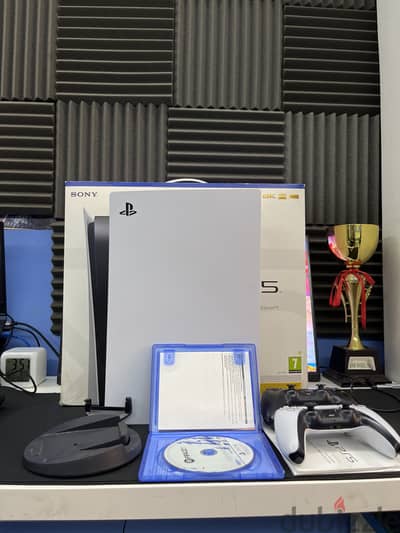PS5 with box and 2 controllers and original game