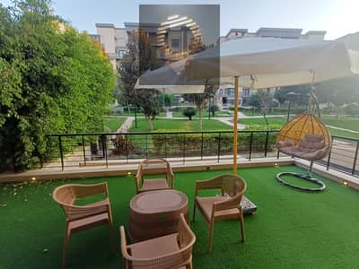 148 sqm apartment for sale in Madinaty, ground floor with a garden in B8, with a private garage and top-level finishing in the kitchen