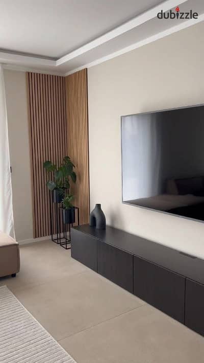 A fully finished apartment inside Palm Hills directly in front of Arkan Plaza with the longest repayment period