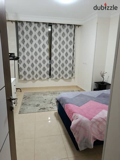Furnished apartment in Compound One Katameya 2 bedrooms and 2 bathrooms and kitchen directly on the Maadi ring road. The compound is in a distinguished location, with swimming pools and also large green spaces and there is a playground for children. There is also Starbucks and there are all services, and the compound is completely surrounded by 