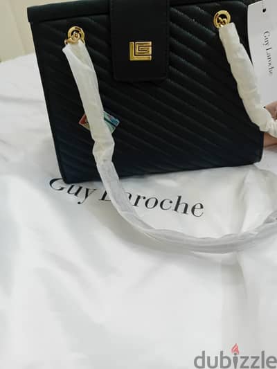 شنطة  GUY LAROCHE  حريمى وارد دبى