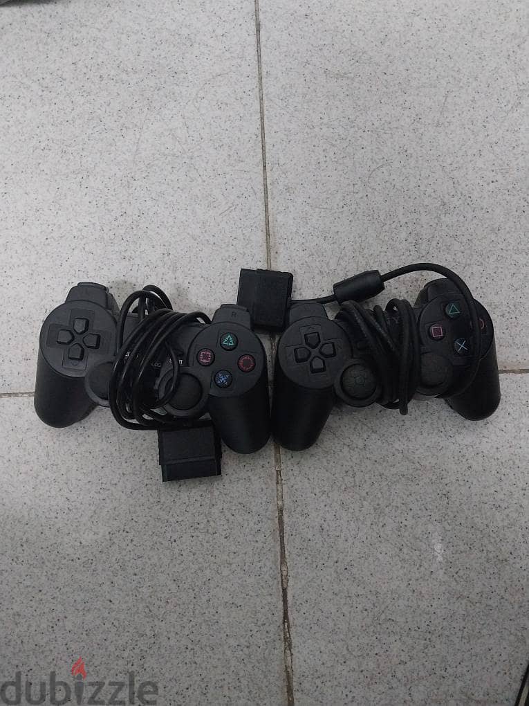 Playstation 2 slim and games 1