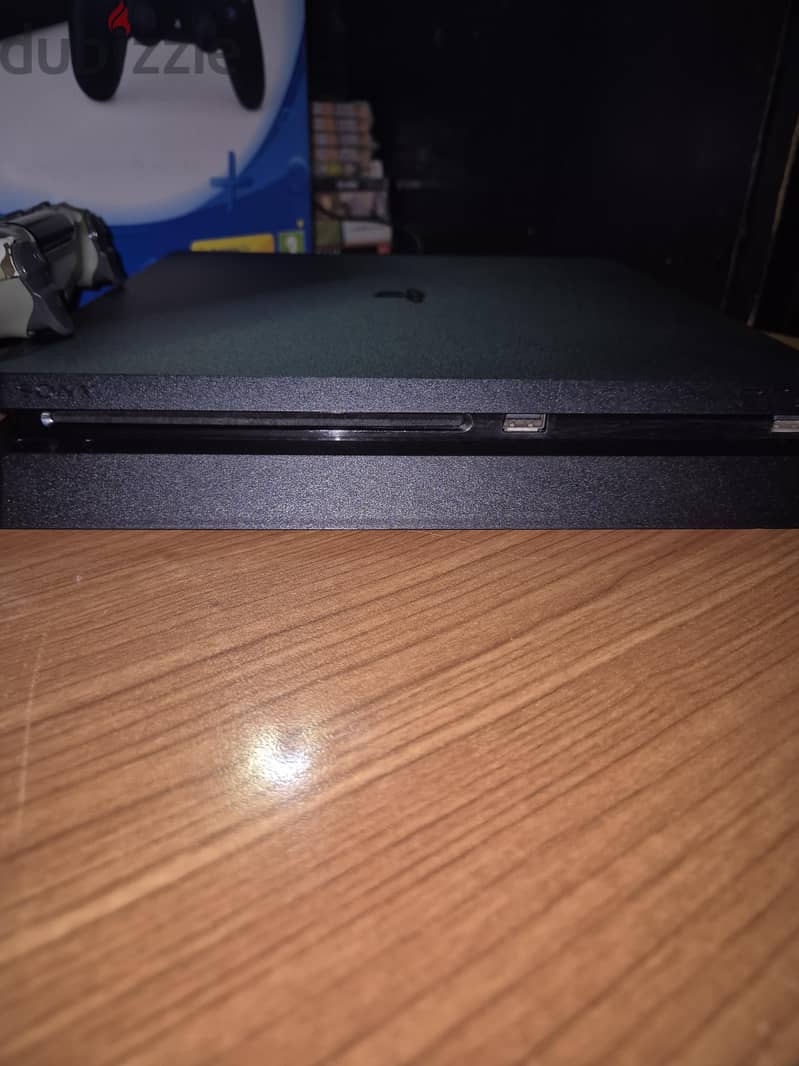 Ps4 Slim 1TB used + Original Controller and CD 1