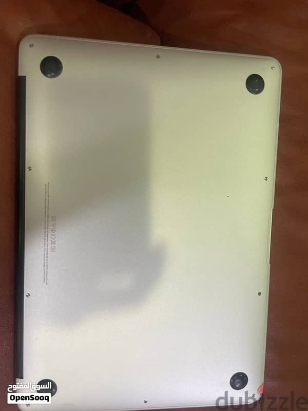 MacBook air + charger 1