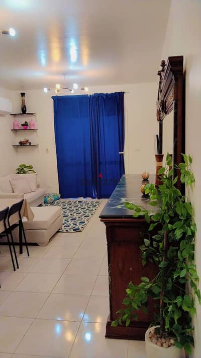 A distinctive furnished apartment for rent in Al-Rehab with an area of 90m