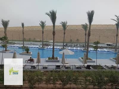 شقة بجاردن جاهزة للاستلام الفوري على حمام سباحة فيو للبيع في أب تاون كايرو إعمار متشطبة بالمطبخ والتكييفات والدريسينج Uptown Cairo Emaar