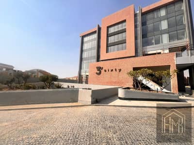 Office for sale in the Three Sixty project, with an area of 95 meters, finished with air conditioning, immediate delivery