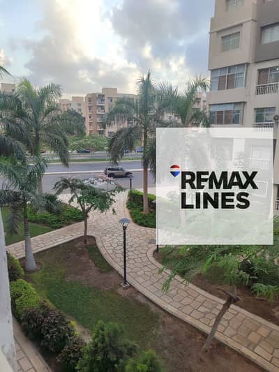 Apartment for sale in Madinaty B10 with open garden view, in a prime location on The Spine and close to services, ultra-super-lux finishes