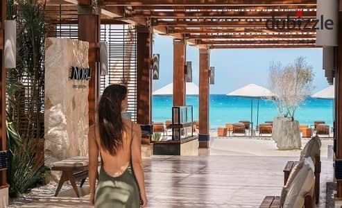 Furnished Hotel Suite in NOBU Hotel Full Sea View Only Steps From The Beach in Ogami Sodic Ras El Hekma North Coast